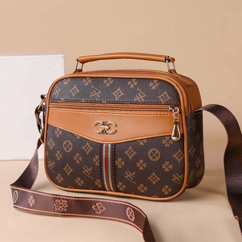 2025 middle-aged handbag four-layer mobile phone bag old flower bag new high-capacity women's diagonal cross brand mother bag