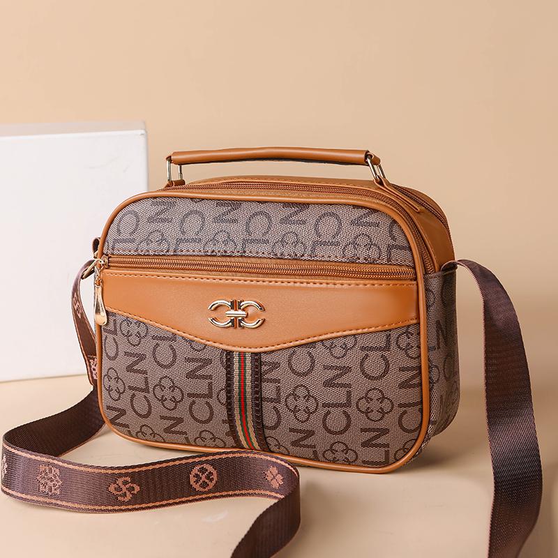 2025 middle-aged handbag four-layer mobile phone bag old flower bag new high-capacity women's diagonal cross brand mother bag