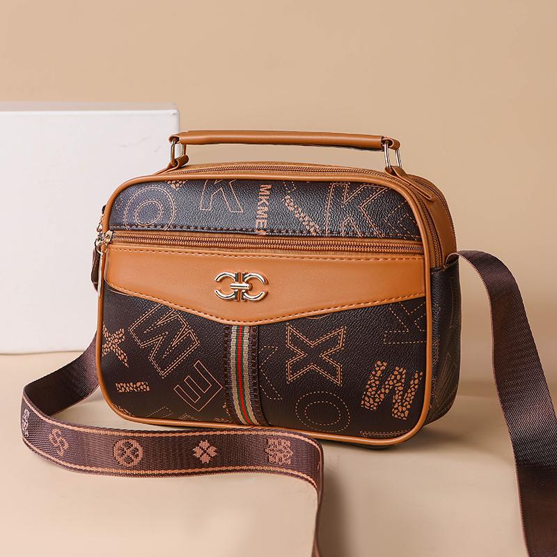 2025 middle-aged handbag four-layer mobile phone bag old flower bag new high-capacity women's diagonal cross brand mother bag