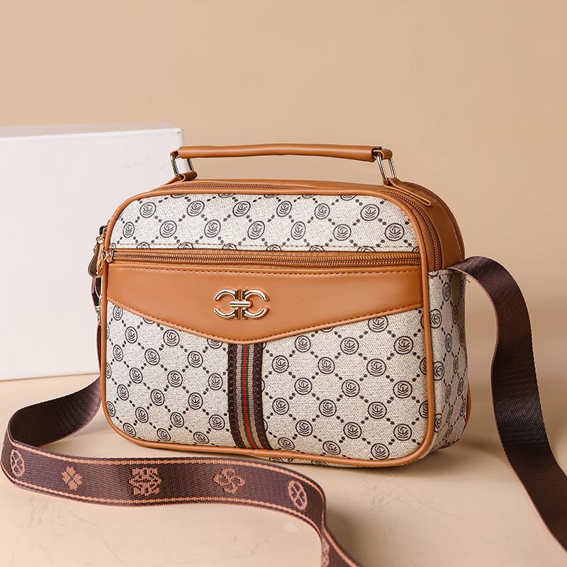 2025 middle-aged handbag four-layer mobile phone bag old flower bag new high-capacity women's diagonal cross brand mother bag