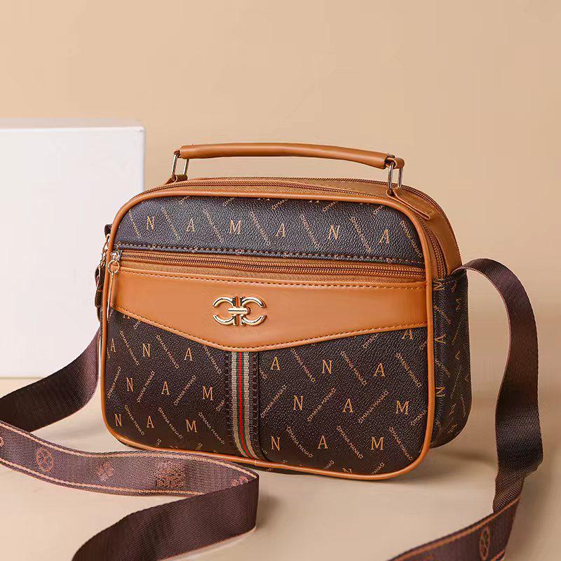 2025 middle-aged handbag four-layer mobile phone bag old flower bag new high-capacity women's diagonal cross brand mother bag