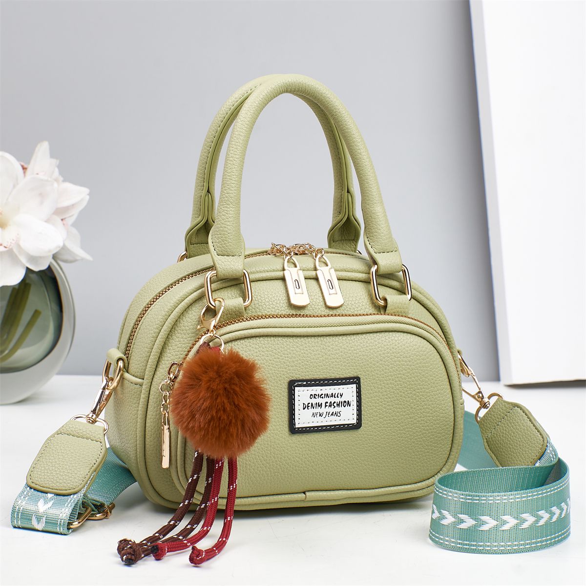 Sage Green Mini Satchel Handbag with Pom Pom Charm and Crossbody Strap