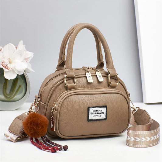 Sage Green Mini Satchel Handbag with Pom Pom Charm and Crossbody Strap